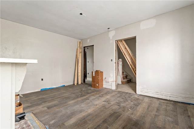 unfurnished room featuring dark hardwood / wood-style floors