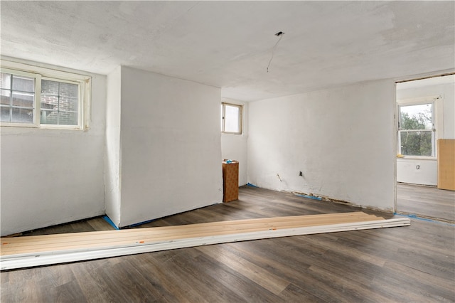 unfurnished room featuring hardwood / wood-style flooring