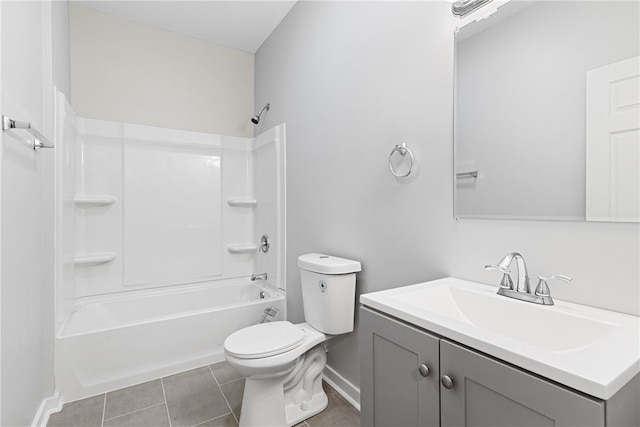 full bathroom with tile flooring,  shower combination, toilet, and large vanity