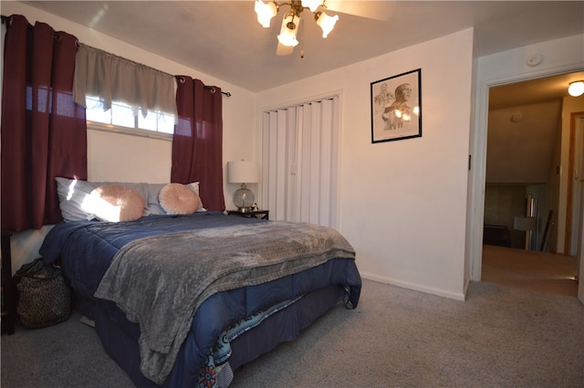 bedroom with ceiling fan and carpet flooring