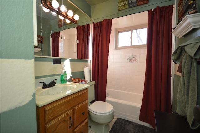 full bathroom with vanity, toilet, and shower / tub combo with curtain