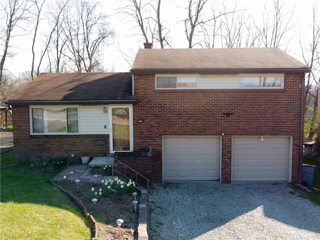 view of front of property with a garage