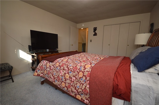 carpeted bedroom with a closet