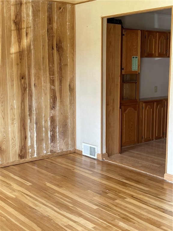 empty room with light wood-type flooring