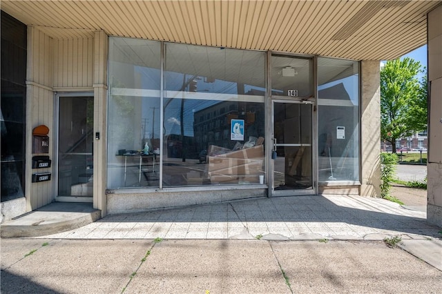 entrance to property with a patio area