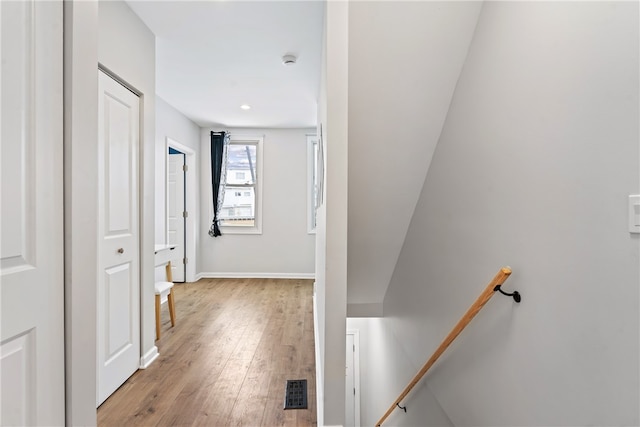 hallway featuring light hardwood / wood-style flooring