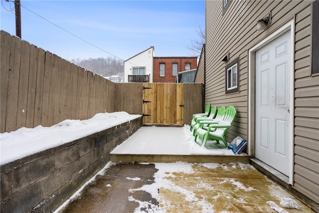 view of snow covered patio