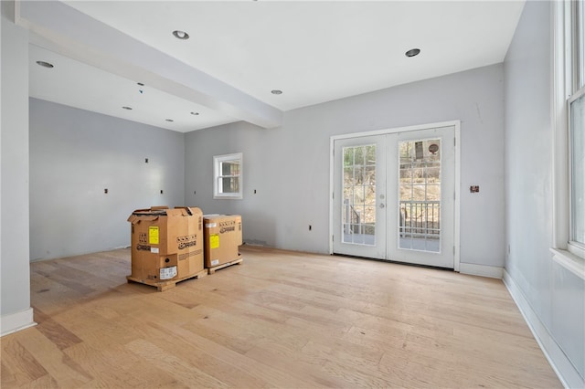 interior space featuring french doors and light hardwood / wood-style flooring