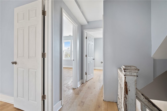 hall with light wood-type flooring