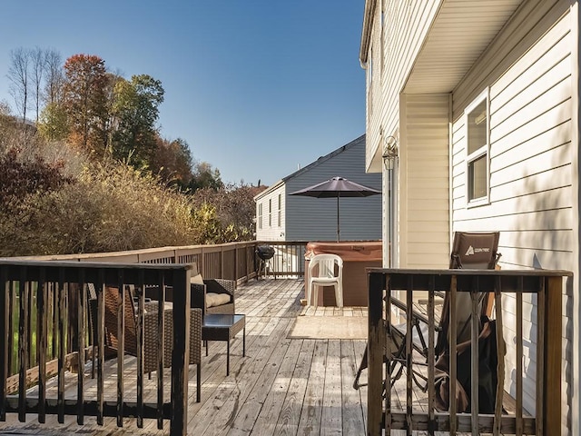 deck with a hot tub