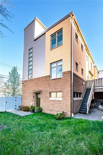 exterior space with a wooden deck and a yard