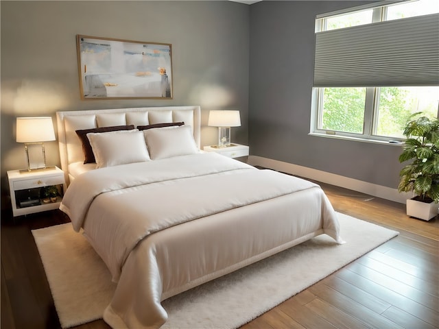 bedroom with light hardwood / wood-style floors