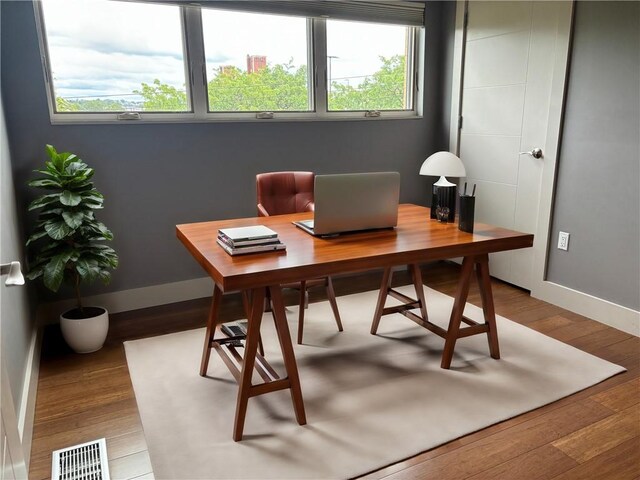 office area with hardwood / wood-style flooring