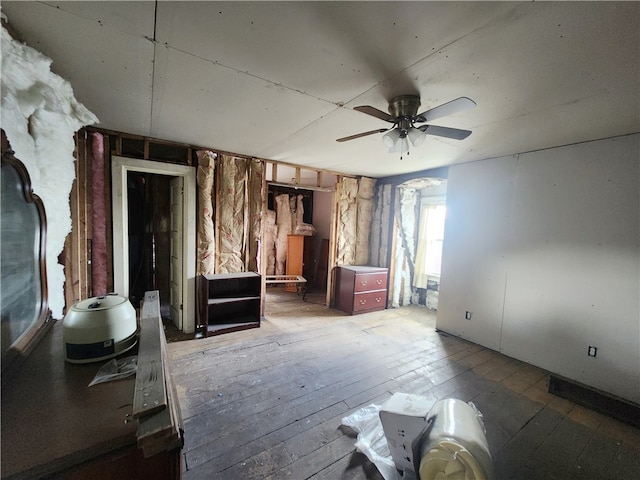 miscellaneous room featuring wood-type flooring and ceiling fan