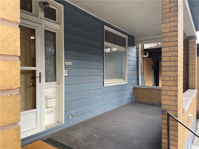 entrance to property with a porch