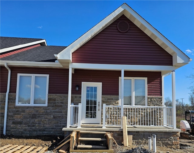 back of house with a porch