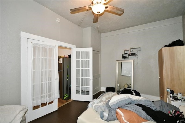 bedroom featuring ceiling fan and dark hardwood / wood-style flooring