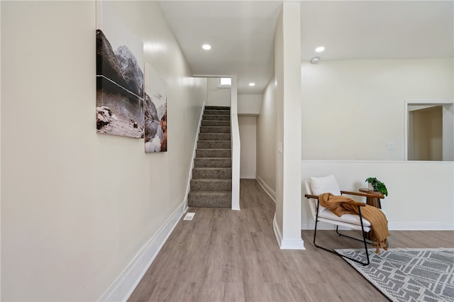 foyer entrance with light hardwood / wood-style floors