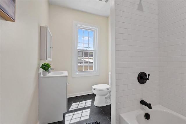 full bathroom with tile flooring, vanity, bathtub / shower combination, and toilet