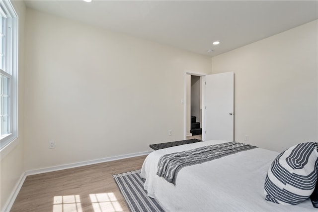 bedroom featuring light hardwood / wood-style floors