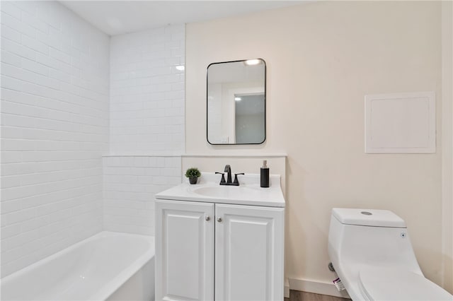 full bathroom featuring vanity, tub / shower combination, and toilet