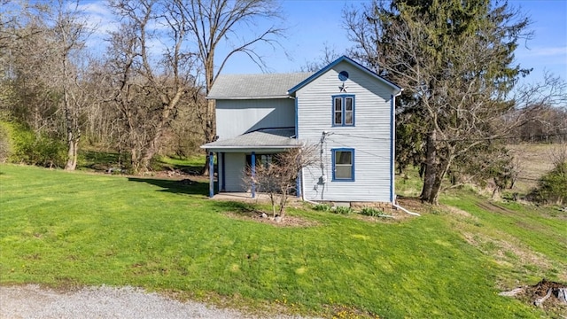 view of property featuring a front yard