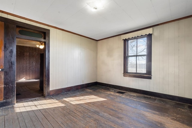 empty room featuring dark hardwood / wood-style floors