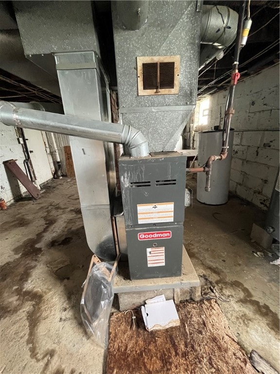 utility room with water heater