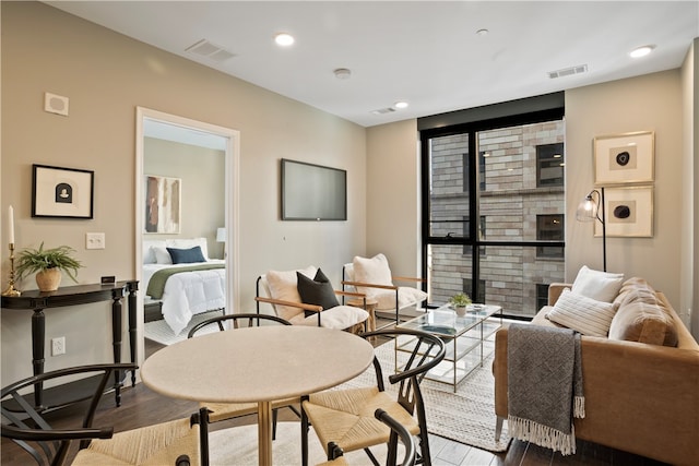 living room with light hardwood / wood-style flooring