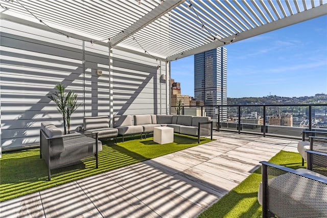 view of patio with an outdoor living space and a pergola