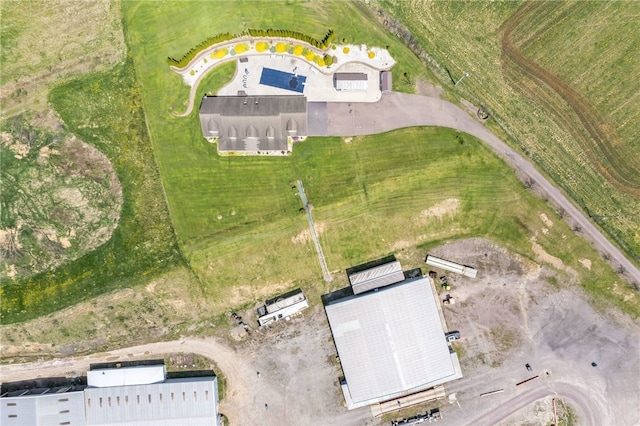 birds eye view of property featuring a rural view