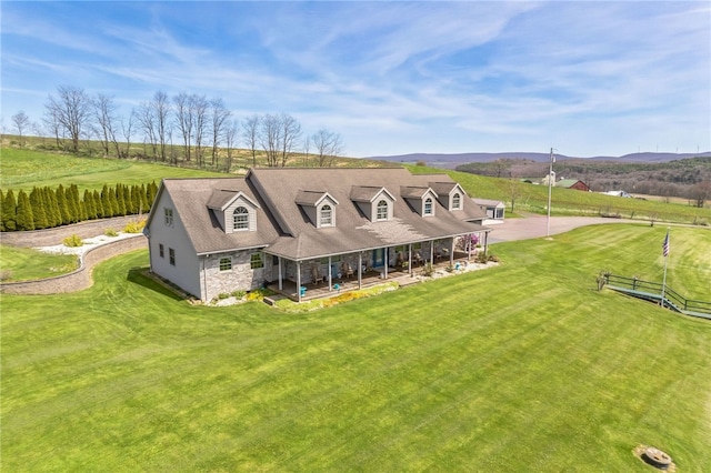 birds eye view of property featuring a rural view