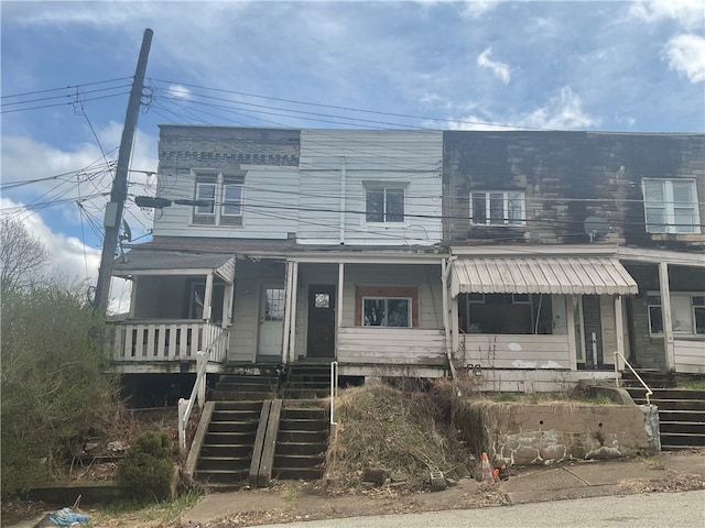 view of front of home featuring covered porch