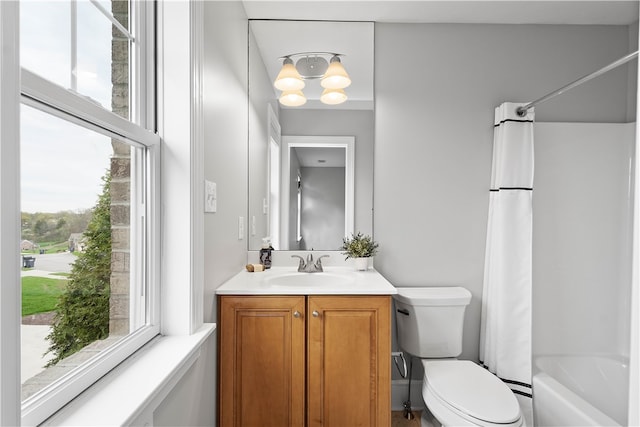 full bathroom with shower / tub combo, toilet, and vanity