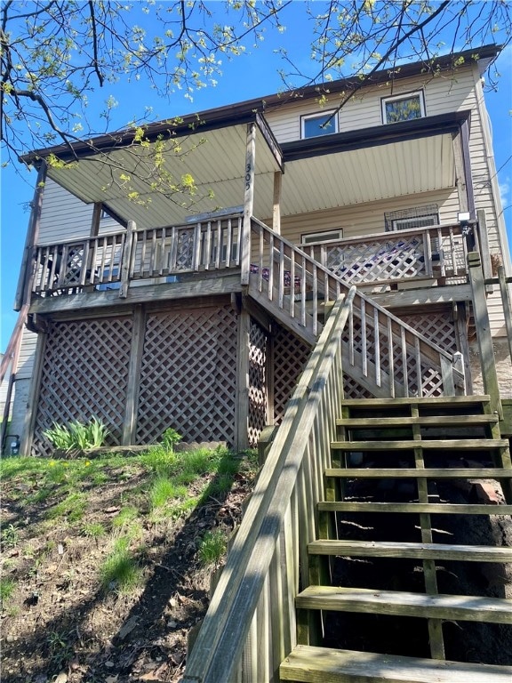 rear view of house with a deck