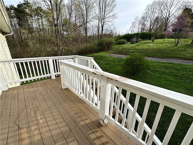 deck featuring a lawn