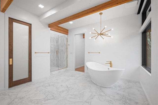 bathroom featuring tile patterned flooring, shower with separate bathtub, and a chandelier