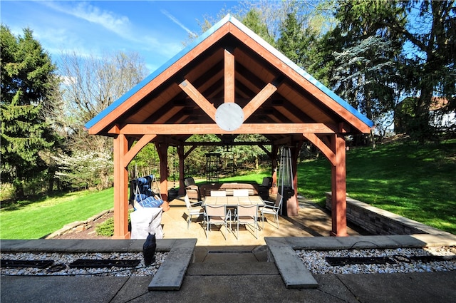 surrounding community featuring a patio area, a lawn, and a gazebo