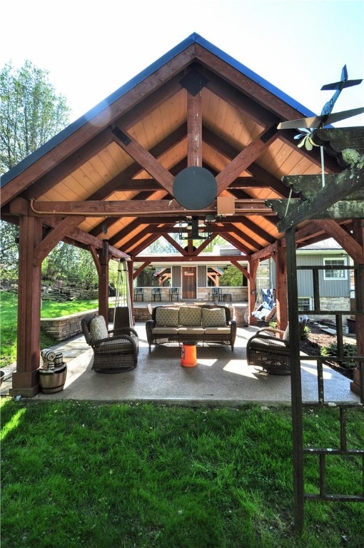 view of home's community featuring a patio, a yard, and a gazebo