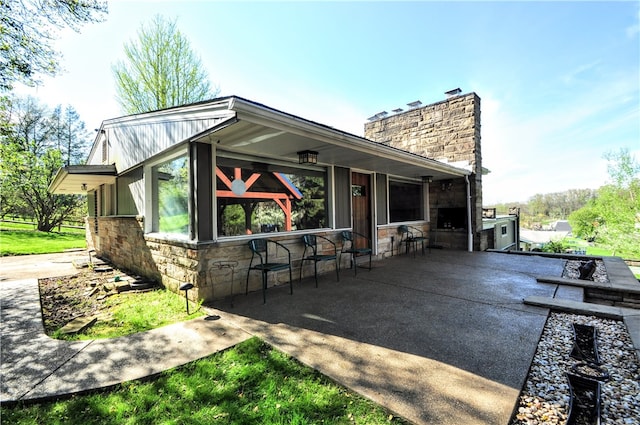 view of front of home with a patio