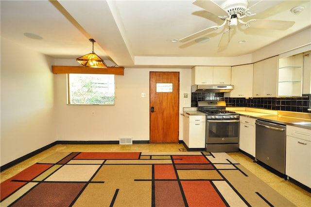 kitchen featuring decorative light fixtures, ceiling fan, stainless steel appliances, tasteful backsplash, and white cabinets