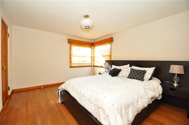 bedroom featuring wood-type flooring