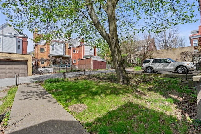 view of yard with a garage