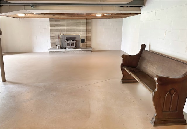 basement featuring a wood stove