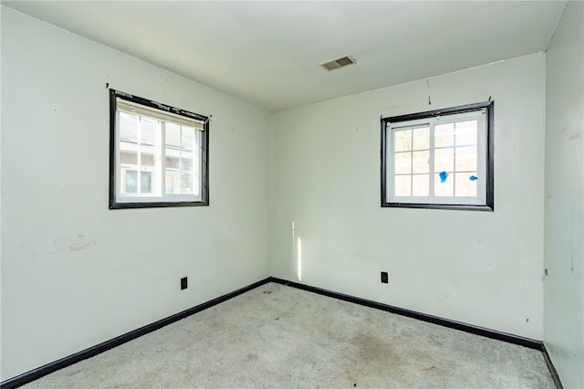 spare room featuring carpet flooring