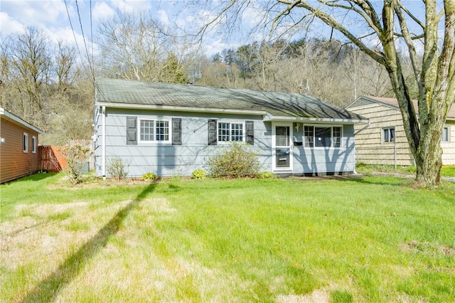 view of front of house with a front lawn