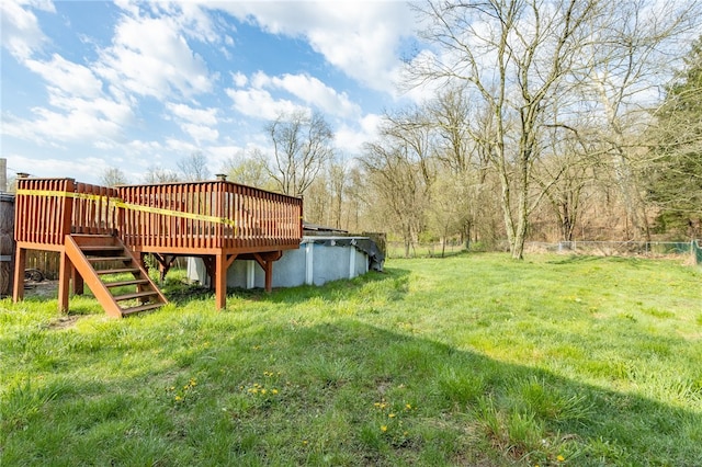 view of yard with a wooden deck