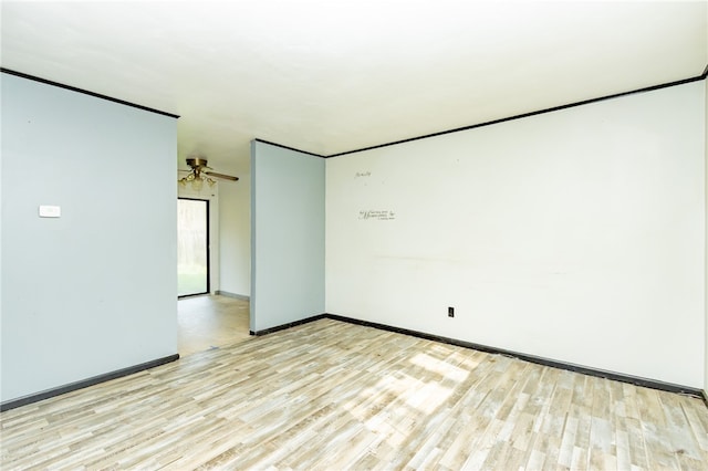 empty room with ceiling fan and light wood-type flooring