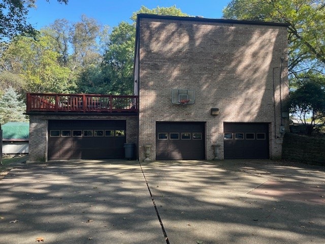 view of side of property with a garage