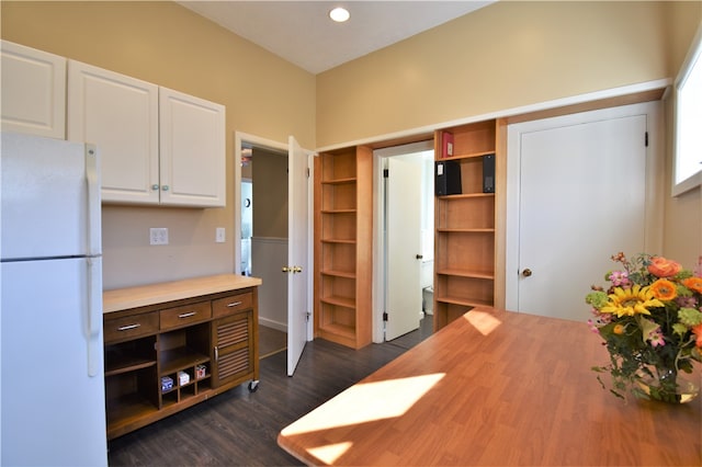 dining area with dark hardwood / wood-style flooring